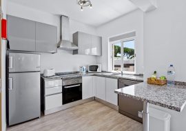 Prado Villas fully equipped kitchen with oven,stove,washing machine and fridge/freezer